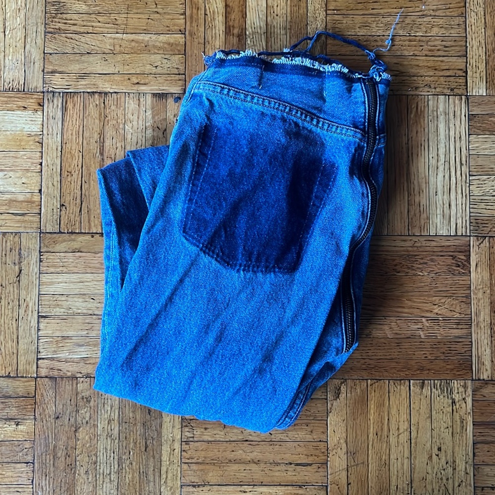 REFORMATION 25 DISTRESSED ZIPPER JEANS